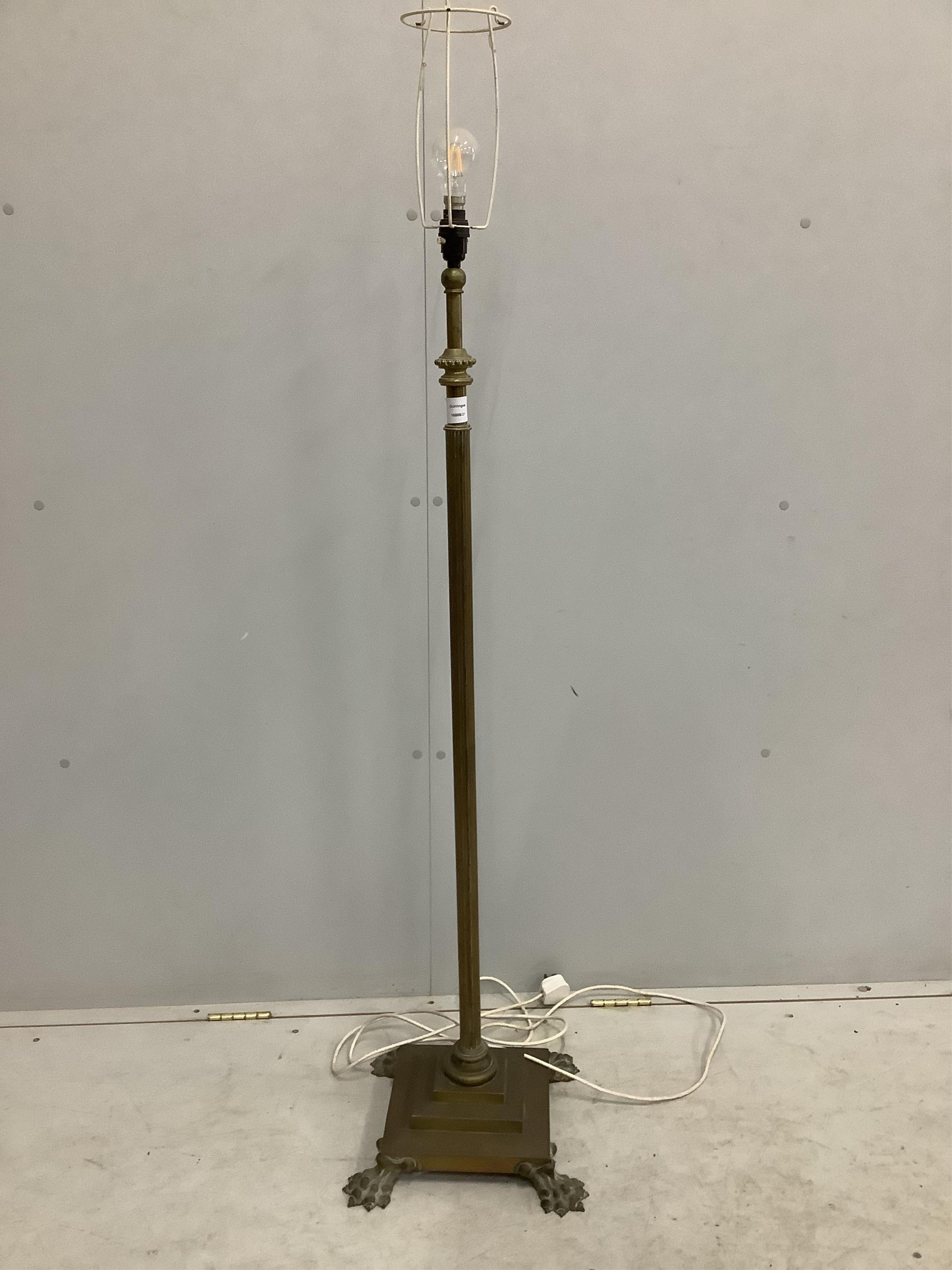 An Edwardian Corinthian column brass telescopic standard lamp. Condition - fair